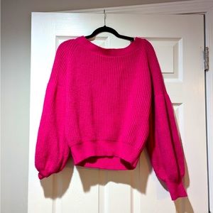Beautiful pink knit sweater with exaggerated sleeves. Made from recycled acrylic